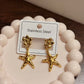 Flower starfish drop earrings
