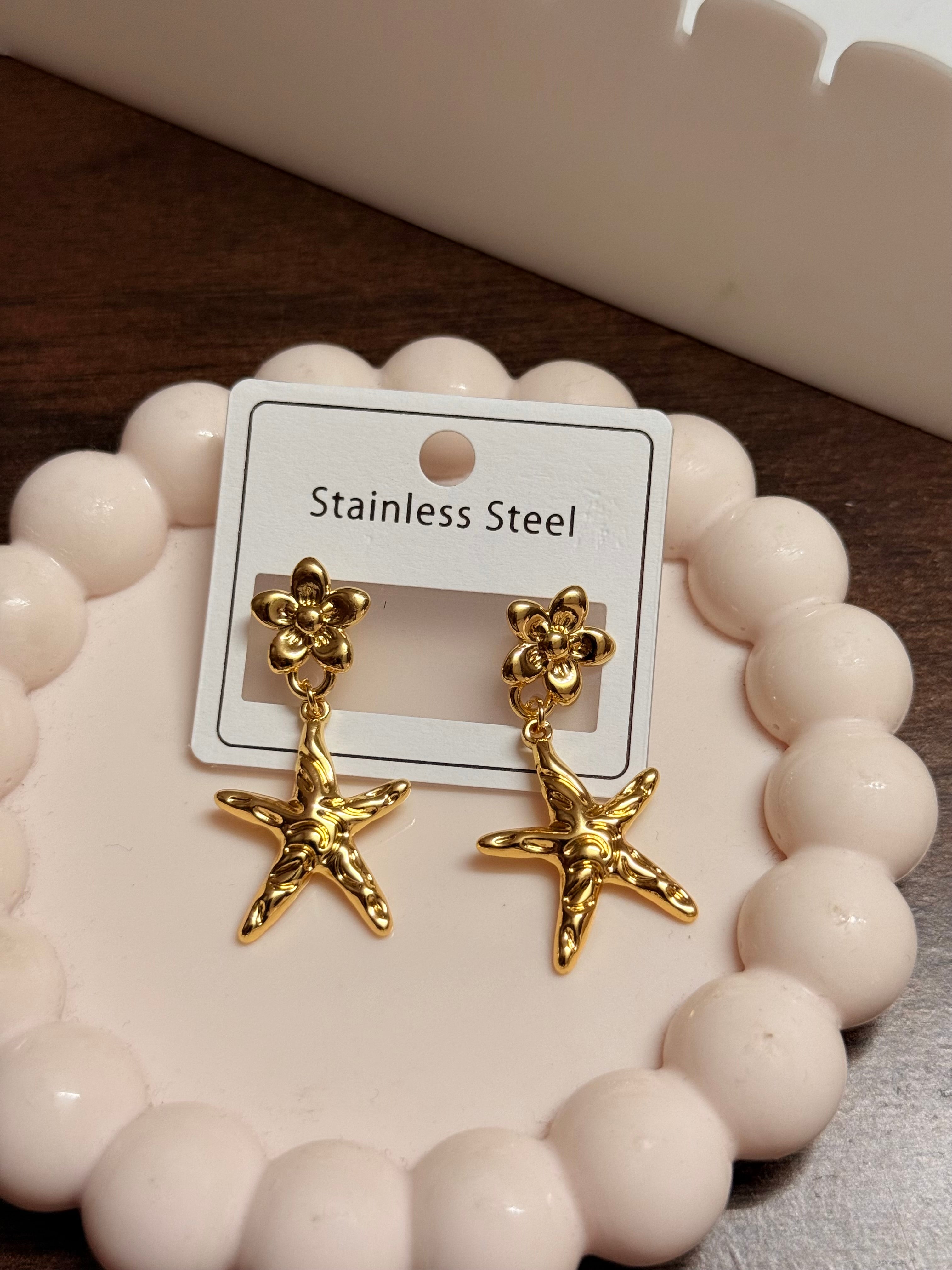 Flower starfish drop earrings