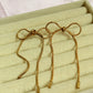 Bow drop earrings