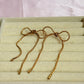 Bow drop earrings