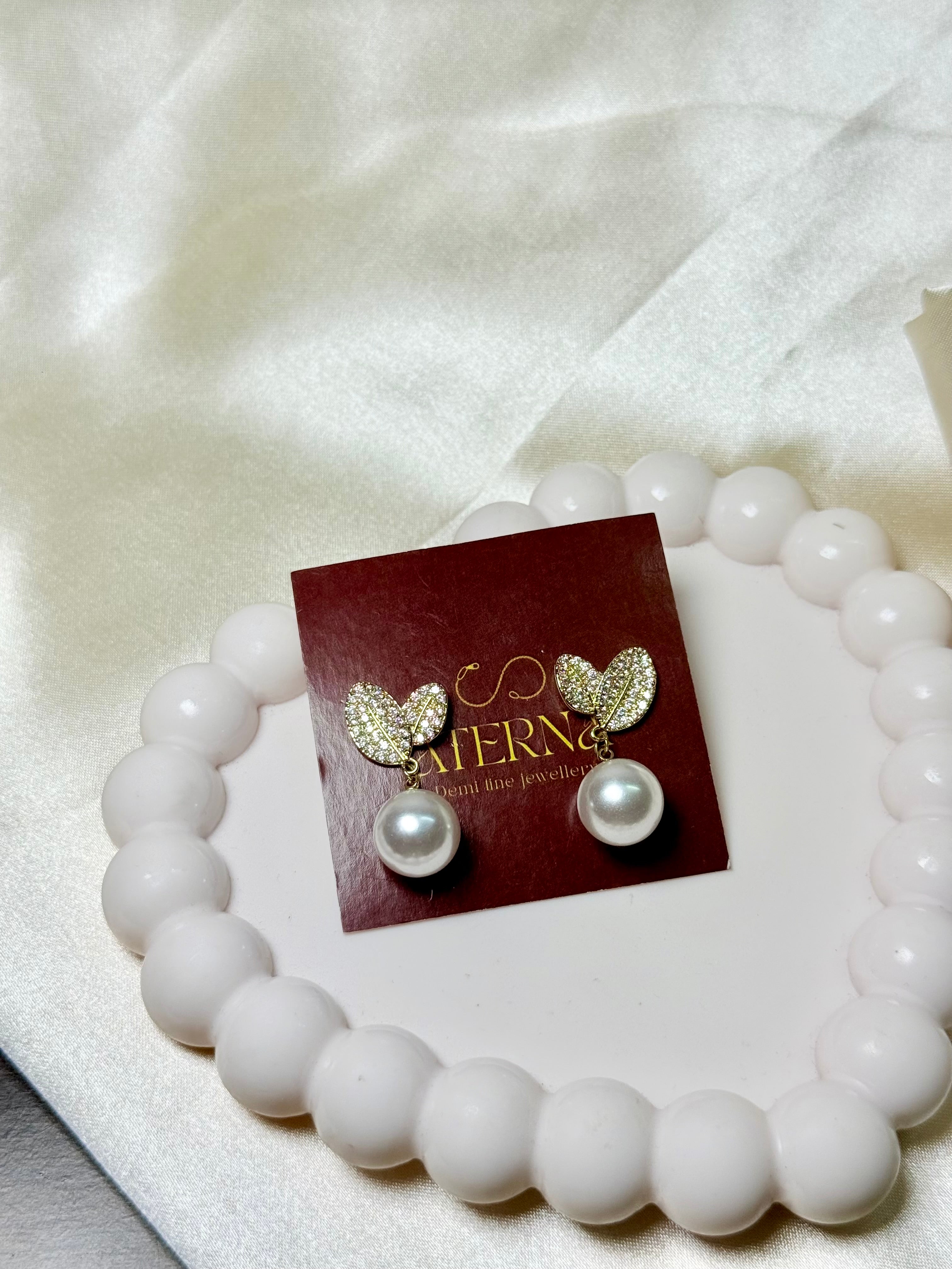 Leaf pearl drop earrings