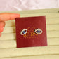 Evil eye studs