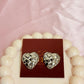 Heart knotted silver earrings