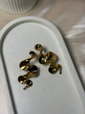 Serpentine flow anti tarnish statement earrings modern style