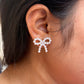 Pearl bow anti tarnish earrings feminine styling